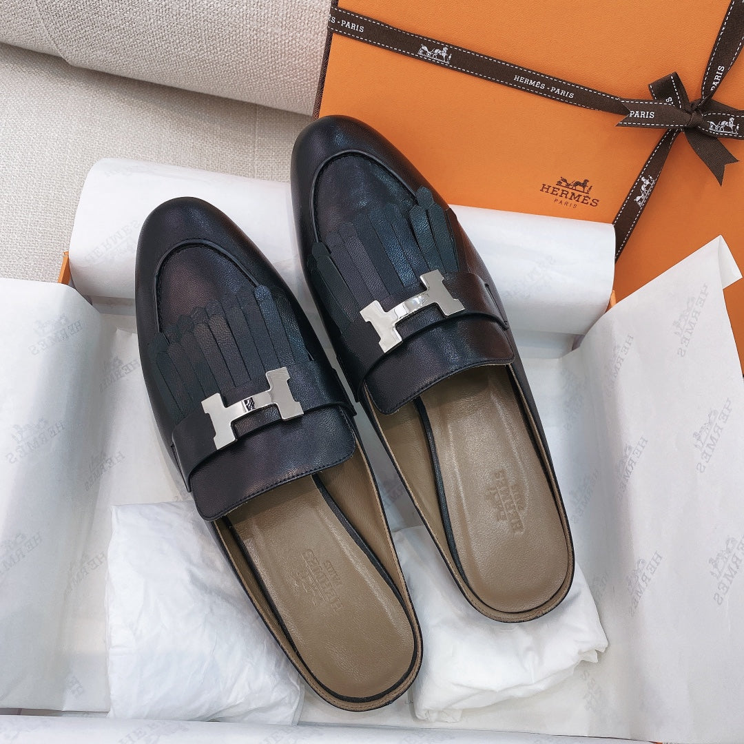 zHERME.S Buckle Tassel Mule Black Goat Leather 348025