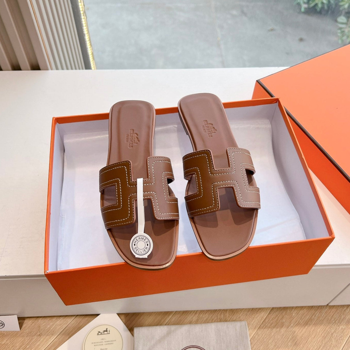 zHERME.S 25 Oran Sandal Brown Calfskin White Thread Embroidery